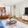 a living room with a tv and a couch