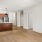 a kitchen with white walls