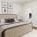 a bedroom with a bed and lamps