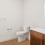 a bathroom with a toilet and sink